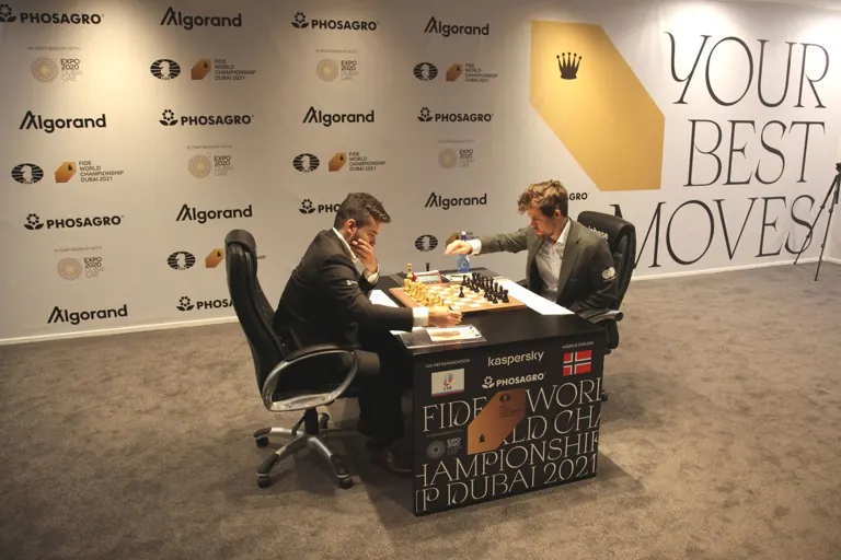 Ian Nepomniachtchi and Magnus Carlsen at the start of game 11 in Dubai