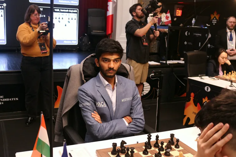 Gukesh seated at the board during the 2024 Candidates Tournament in Toronto.
